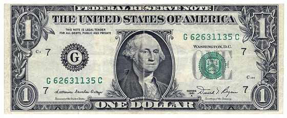US Dollar Bill and Exchange Rates with UK Pounds